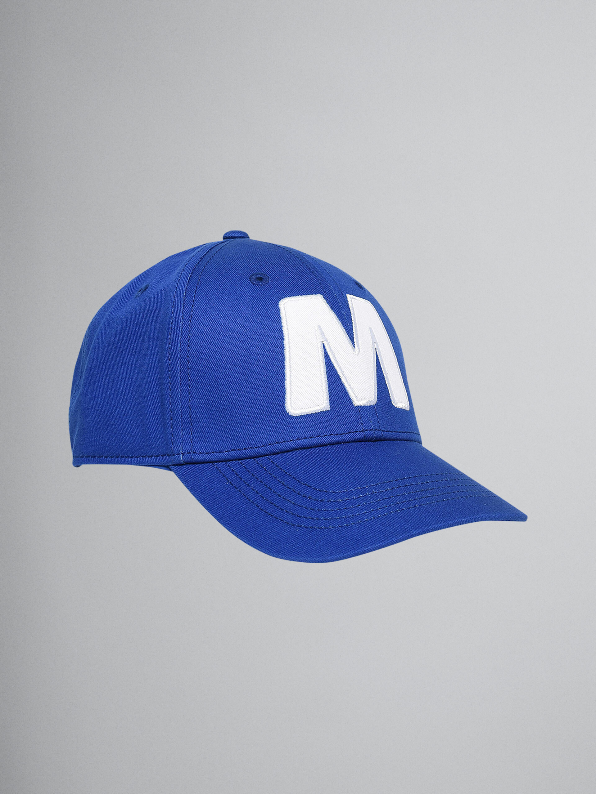"M" blue cotton gabardine baseball cap - Caps - Image 1