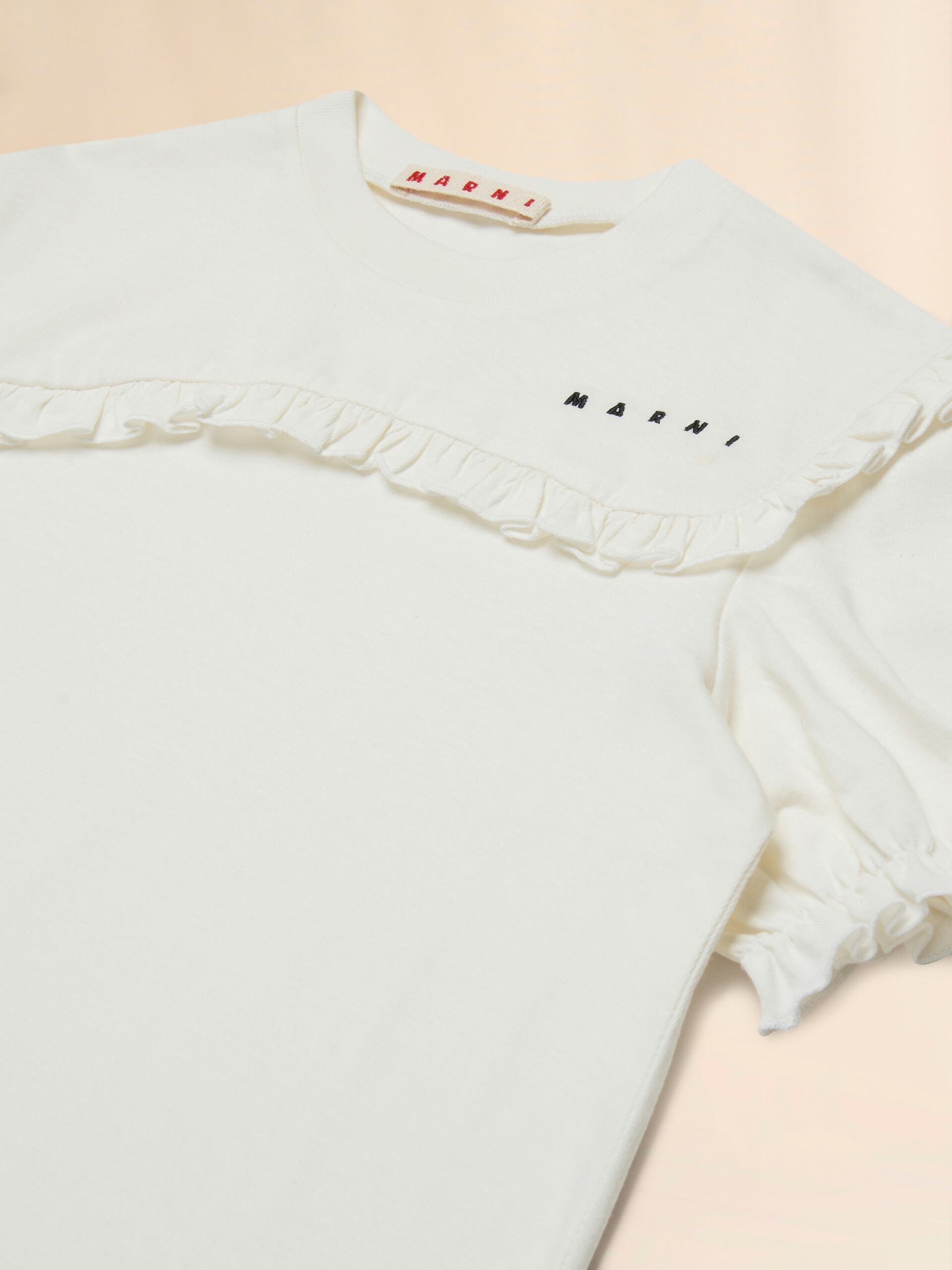 Cremefarbenes Baumwoll-T-Shirt mit Rüschenbesatz - T-shirts - Image 3