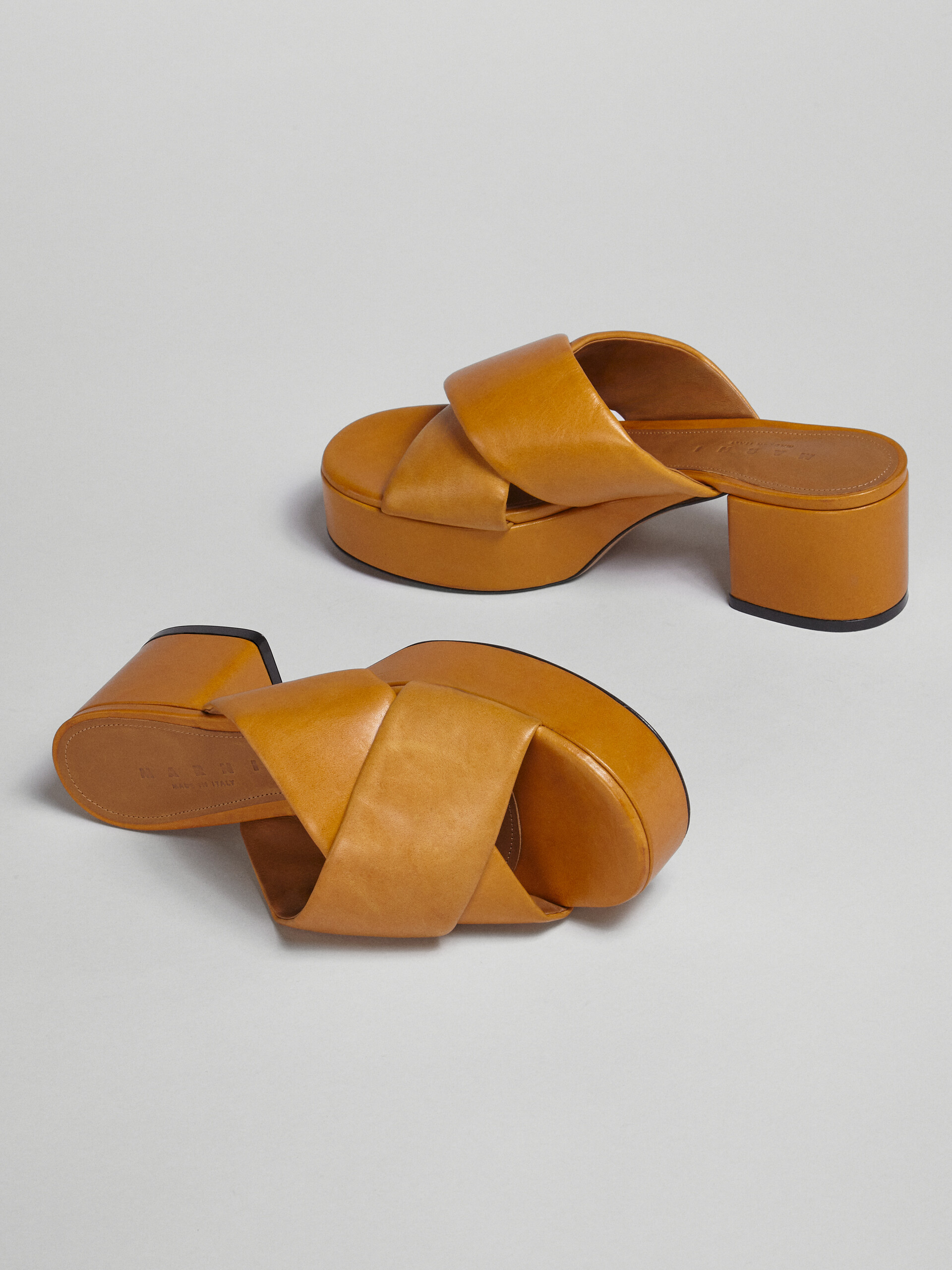 tan cross sandals