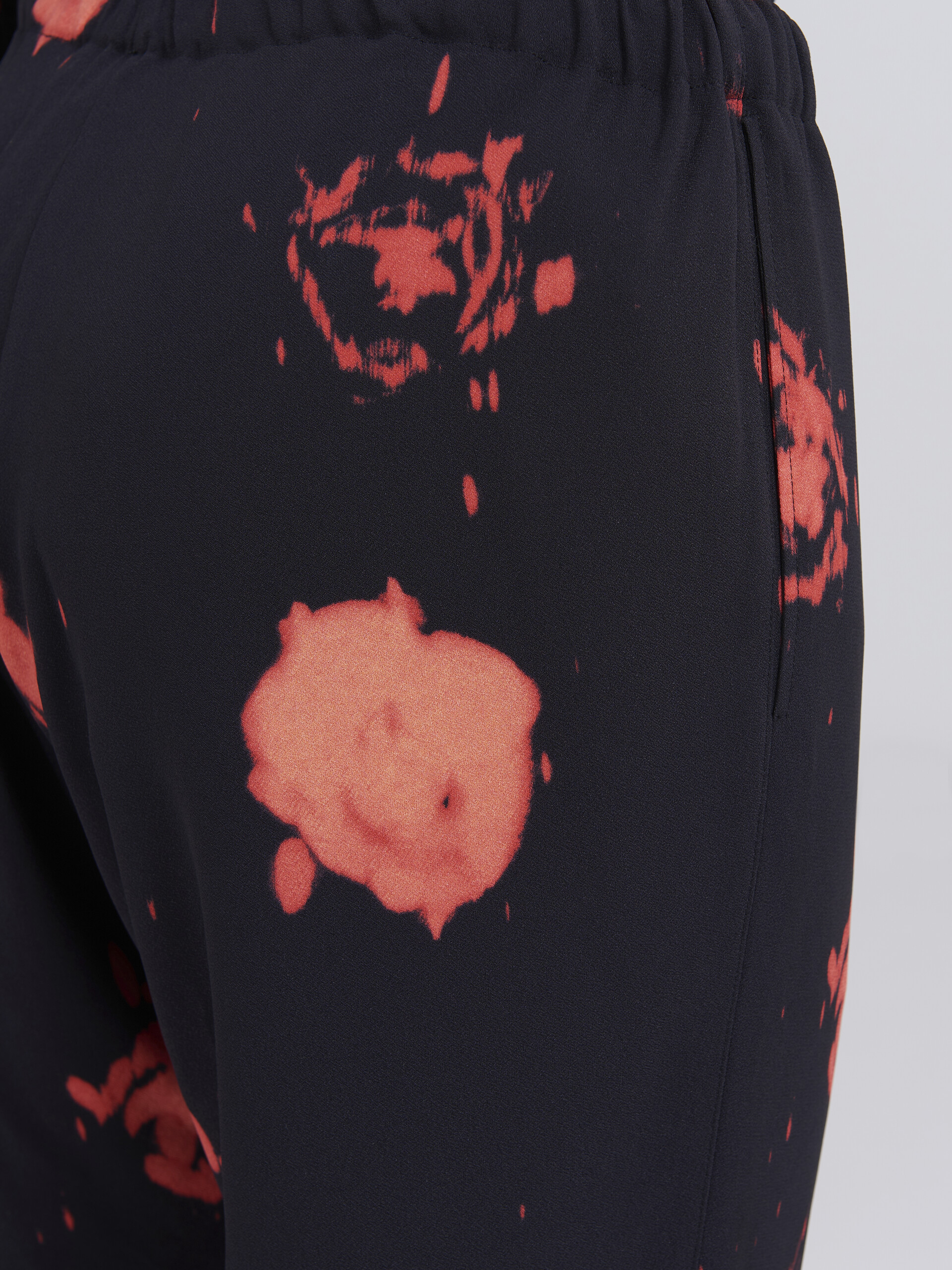 Faded Roses print viscose sablé trousers - Pants - Image 4