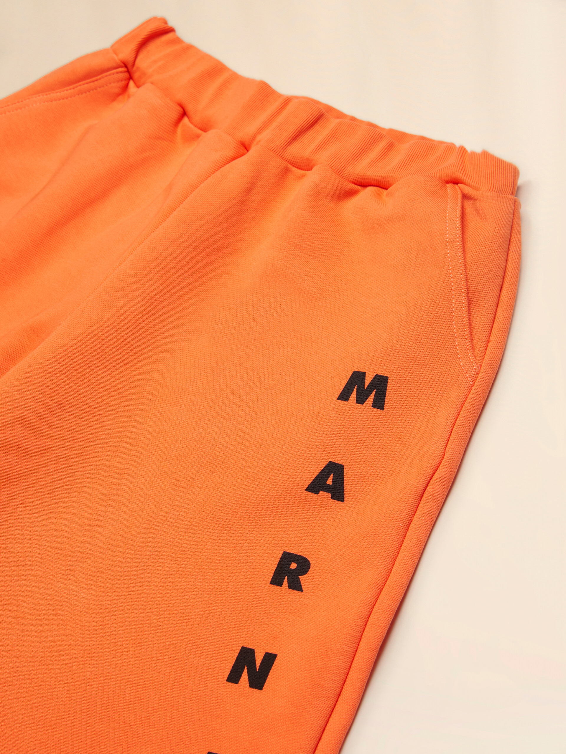 Orange cotton sweat shorts with Marni print - Pants - Image 3