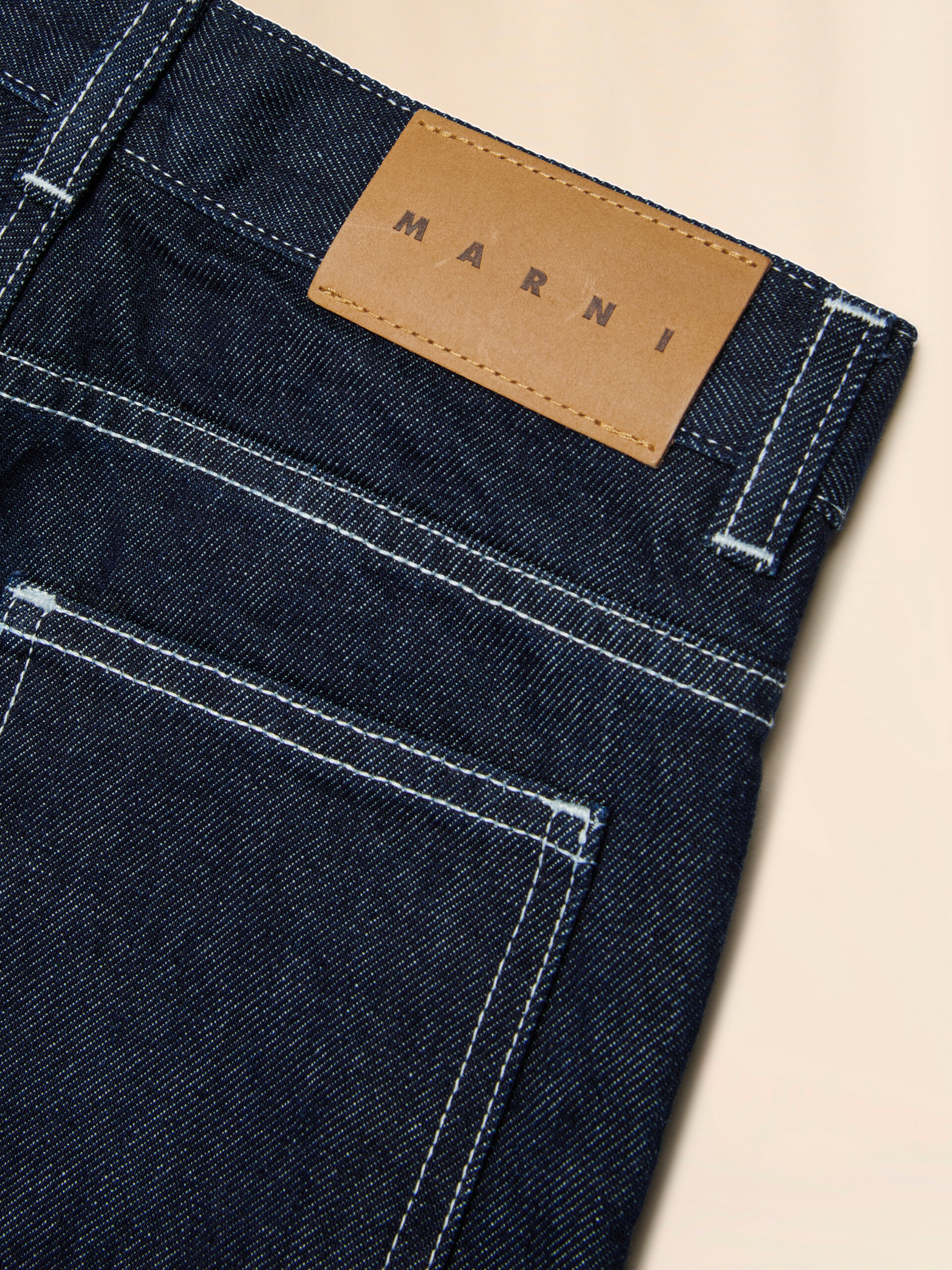 Deep blue denim jeans with white stitching - Pants - Image 4