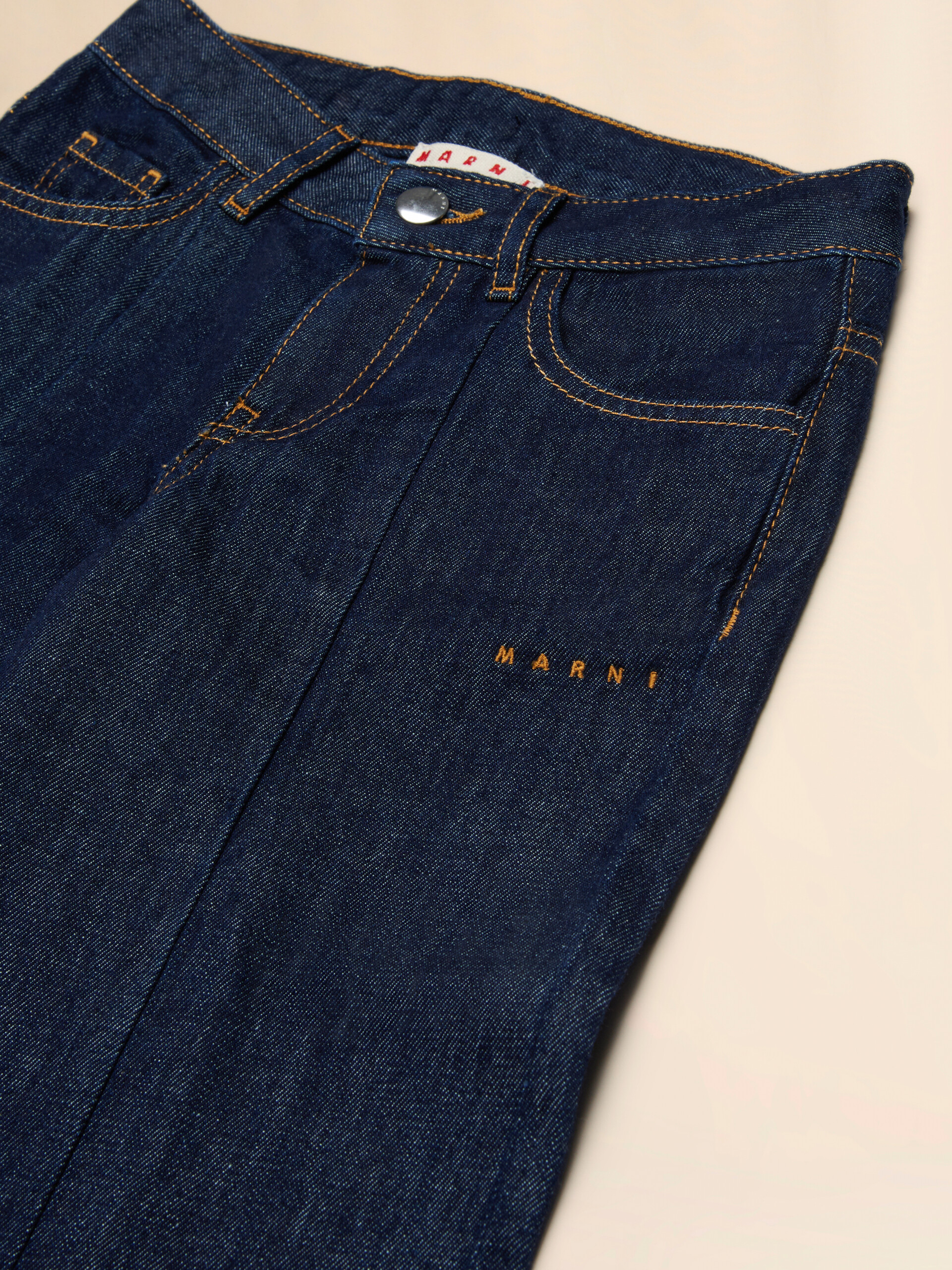 Deep blue denim jeans with tobacco stitching - Pants - Image 3