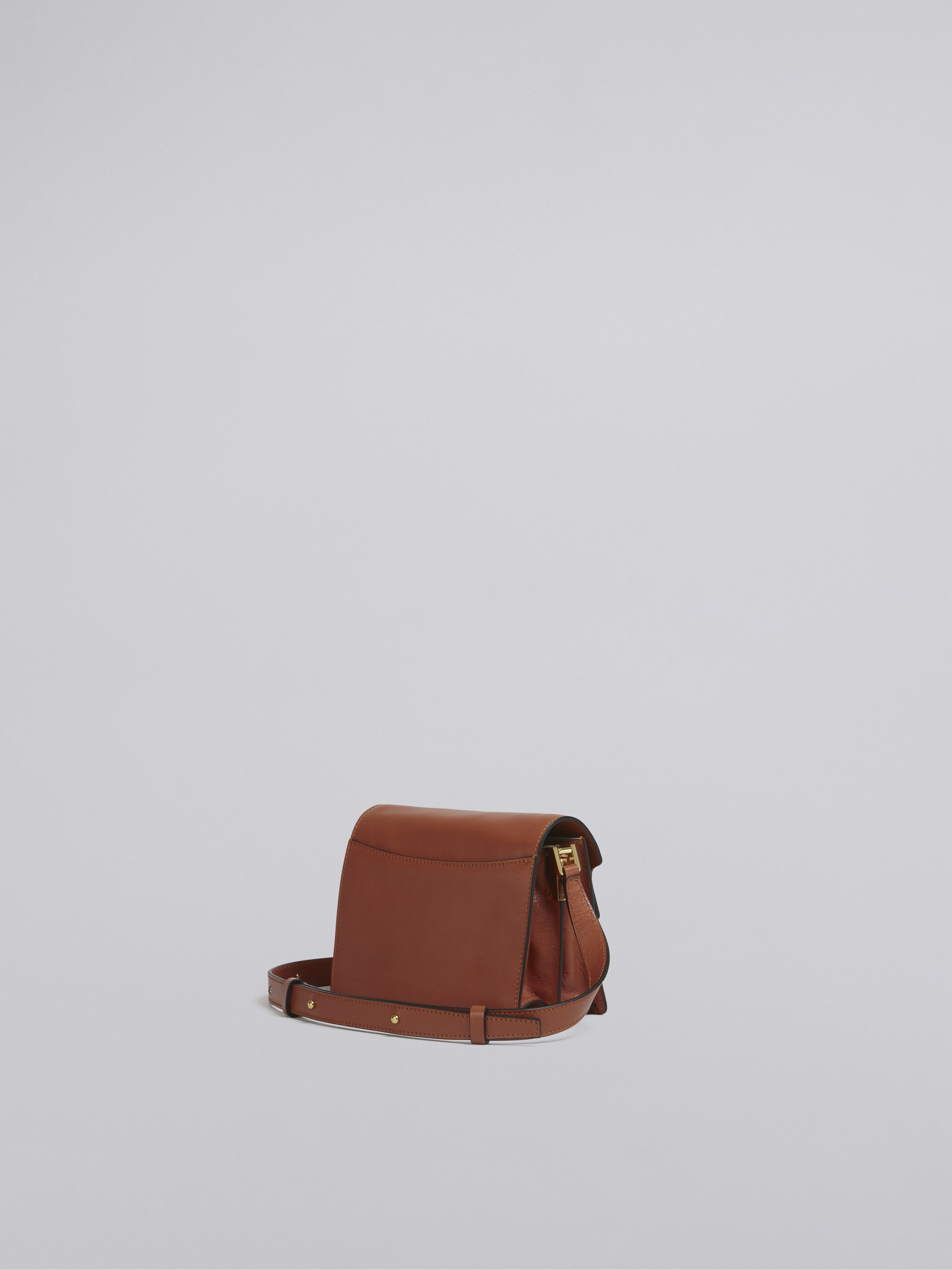 TRUNK SOFT mini bag in orange leather