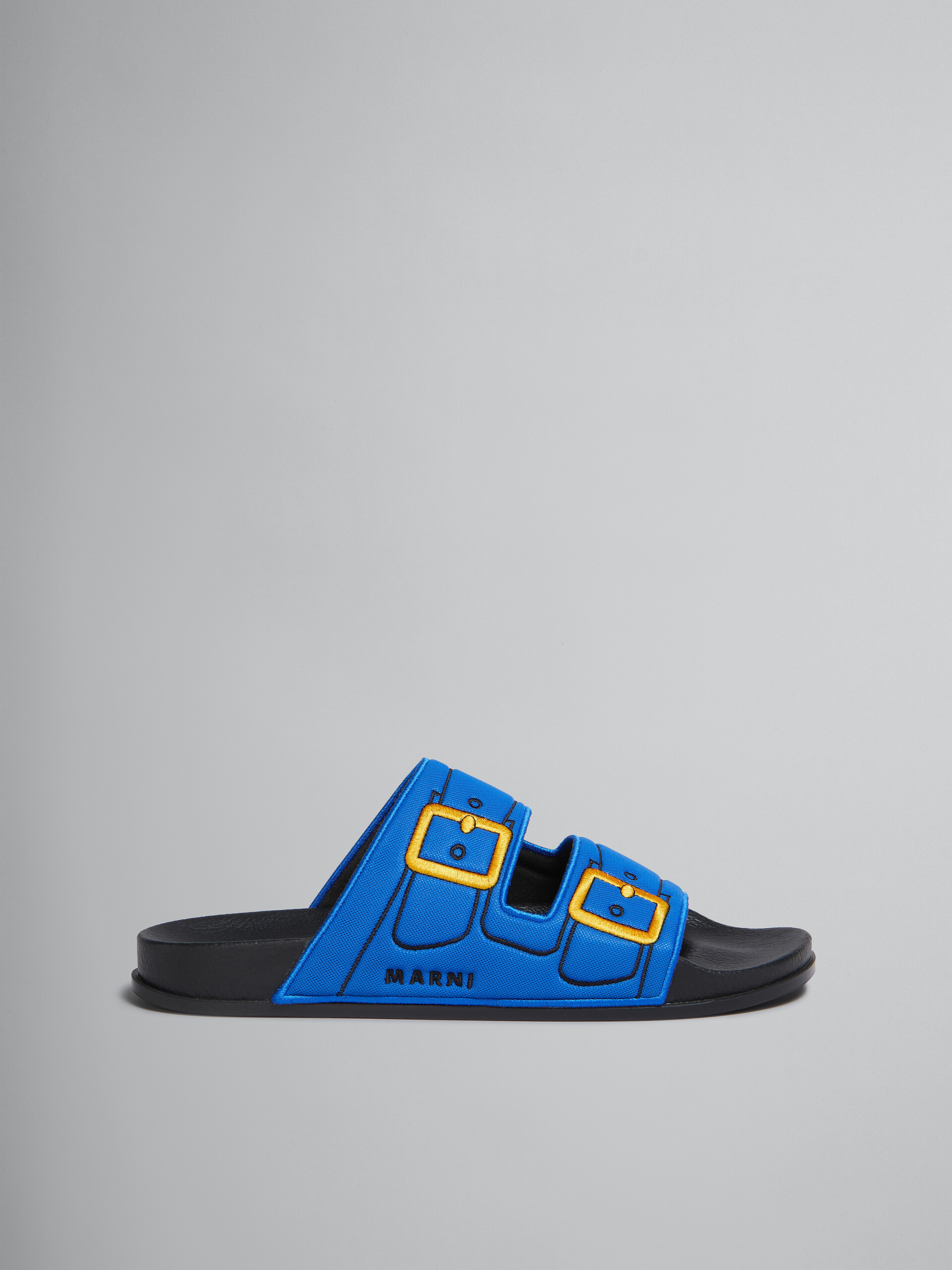 Blue trompe l'oeil slider with embroidered buckles - Sandals - Image 1