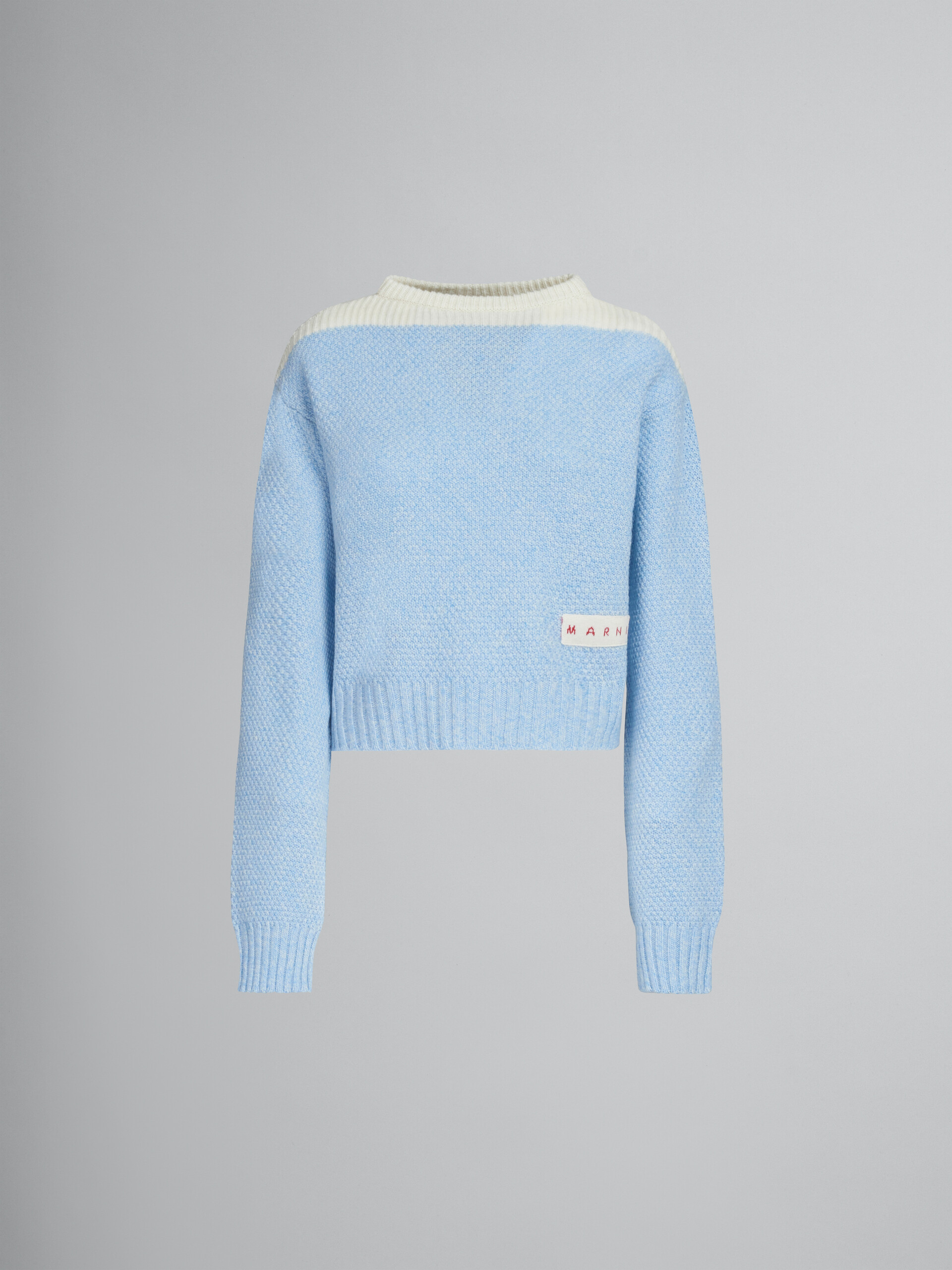 대비를 이루는 네크라인이 돋보이는 라이트 블루 박시 울 점퍼 - 풀오버 - Image 1