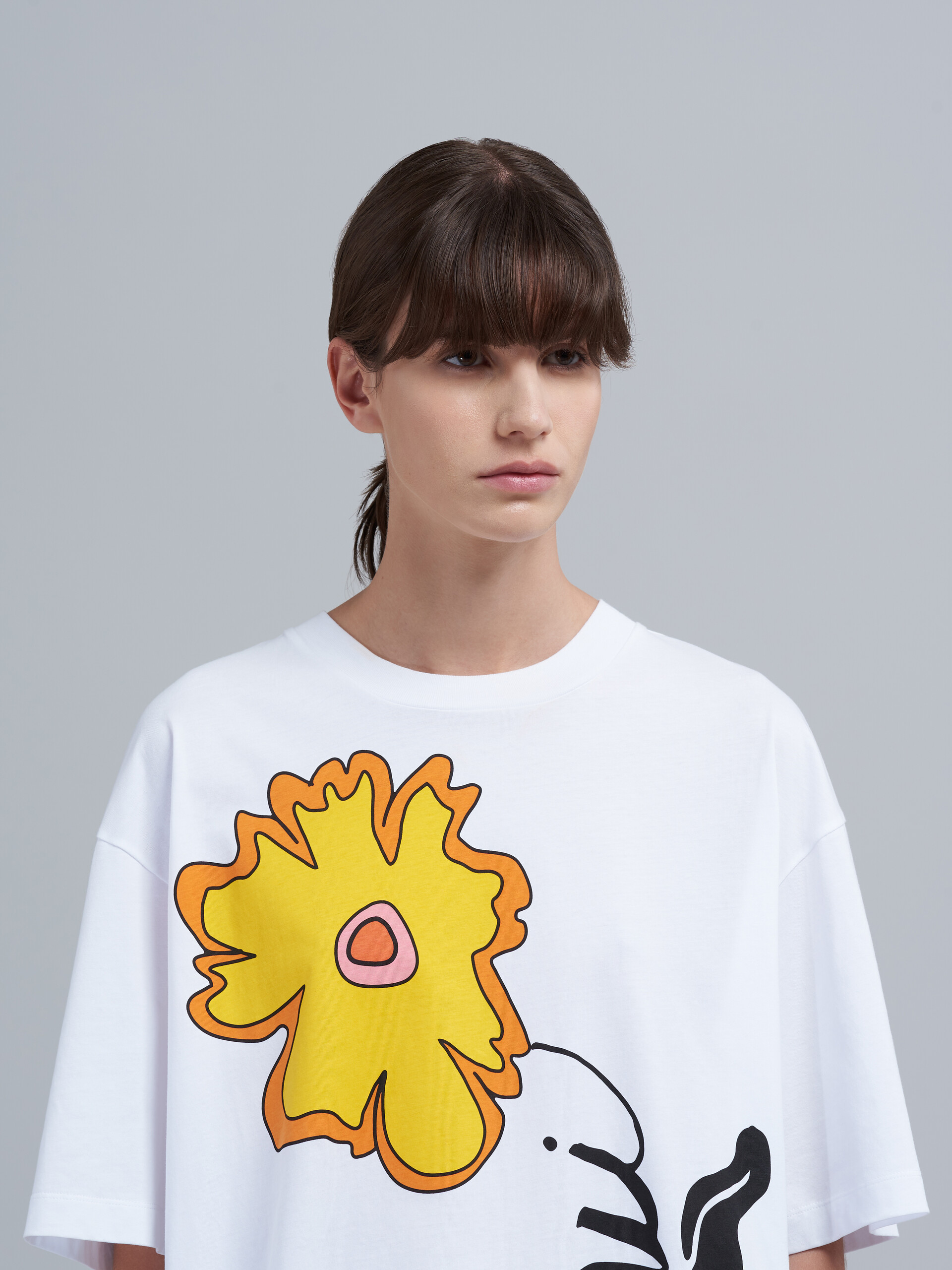 rapper with dogs shirt